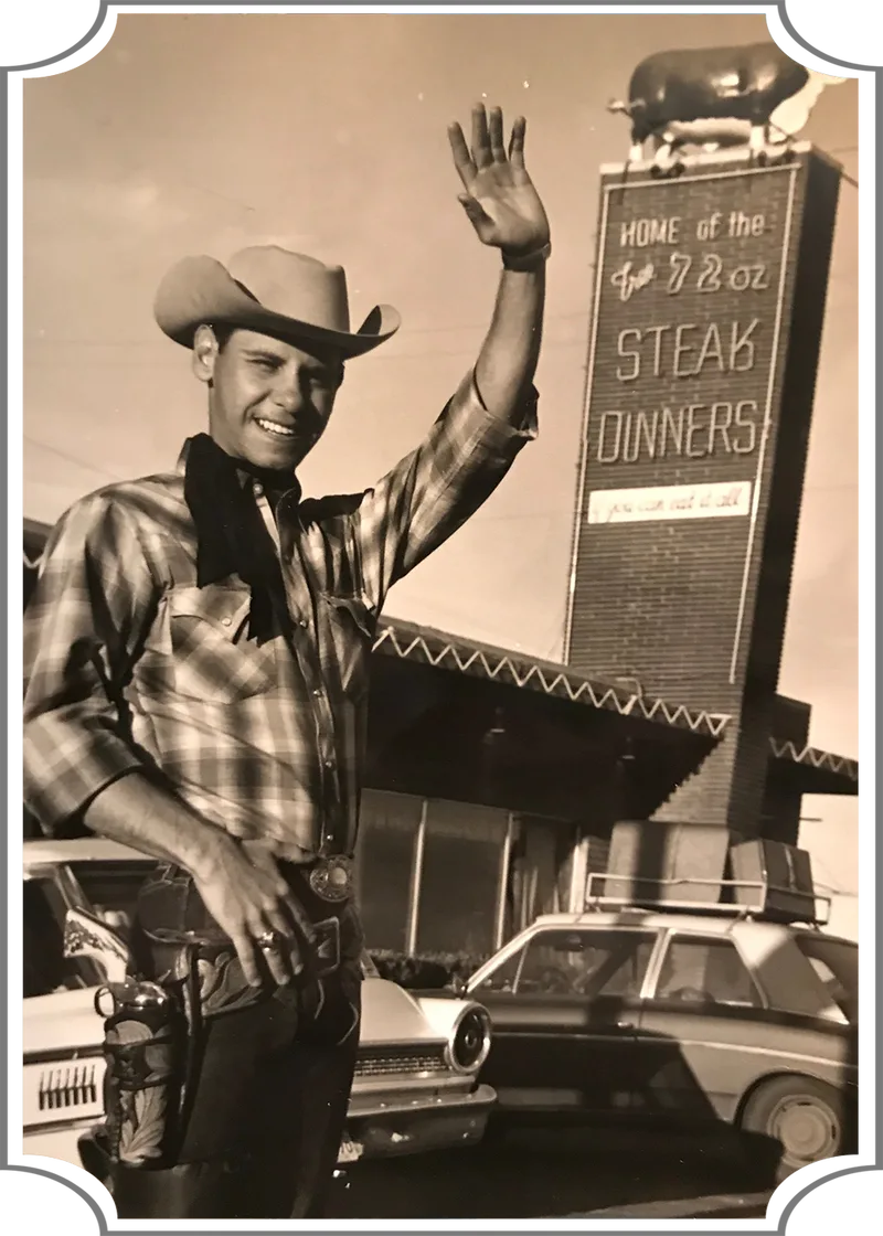 Historic Big Texan cowboy and 72oz Steak Dinner sign